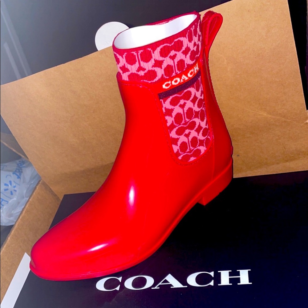Candy apple red coach boots size 10 got an extra pair on accident